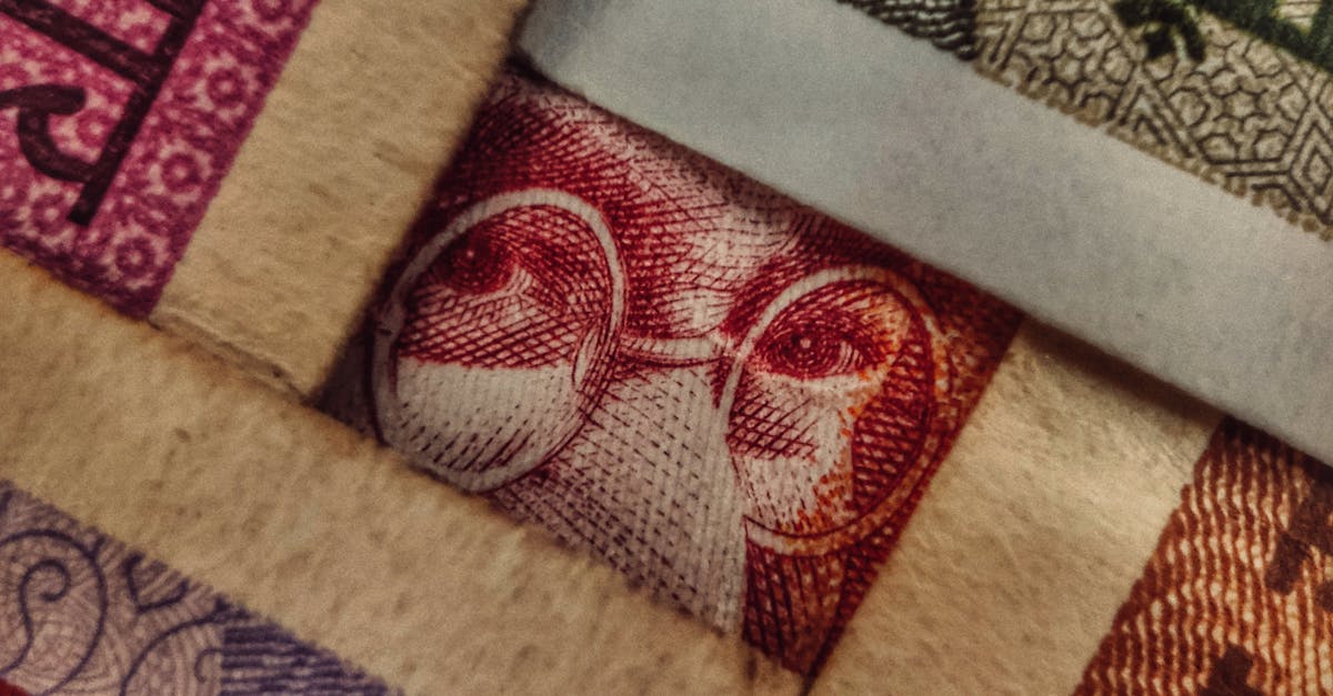 रिझर्व बँकेची धुळफेक करणारी मोहीम Detailed close-up of various Indian currency notes displaying intricate designs and vibrant colors.